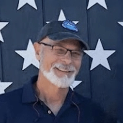 Casey Fishburn, DMD About In Front Of Painted Stars